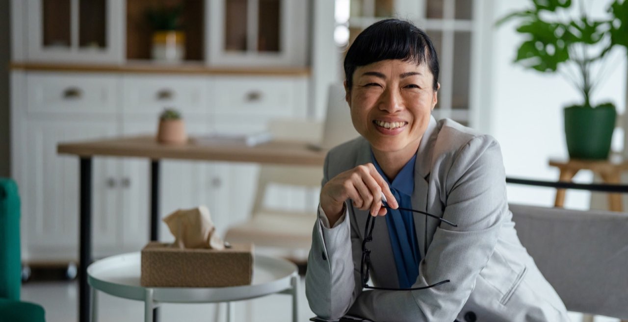 Vye provider smiling in her office
